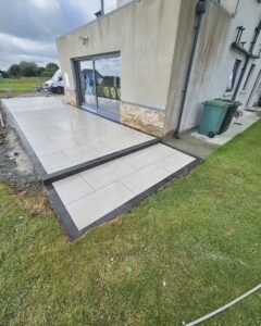 Modern porcelain patio installed in an Irish garden