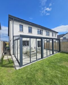 Modern aluminium veranda with sliding glass doors in Ireland